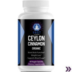 Close-up of an Organic Ceylon Cinnamon supplement bottle detailing benefits for brain function, weight loss, and blood sugar support.