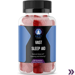 Close-up of VAST Sleep Aid gummy bottle focusing on the label with natural sleep aid claim and quantity."